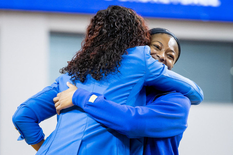 Kentucky Wildcats guard Robyn Benton (1) hugs head coach Kyra Elzy on Senior Day before the Kentucky vs. Tennessee womens basketball game on Sunday, Feb. 26, 2023, at Memorial Coliseum in Lexington, Kentucky. Tennessee won 83-63. Photo by Olivia Hall | Staff