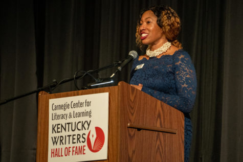 Shayla D. Lynch, Executive Director of the Carnegie Center, speaks during the 2023 Kentucky Writers Hall of Fame Induction Ceremony on Thursday, March 23, 2023, at the Kentucky Theatre in Lexington, Kentucky. Photo by Travis Fannon | Staff