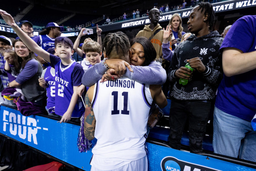 Kansas State Wildcats forward Keyontae Johnson (11) hugs his mother after the No. 6 Kentucky vs. No. 3 Kansas State mens basketball game in the second round of the NCAA Tournament on Sunday, March 19, 2023, at Greensboro Coliseum in Greensboro, North Carolina. Kansas State won 75-69. Photo by Jack Weaver | Staff