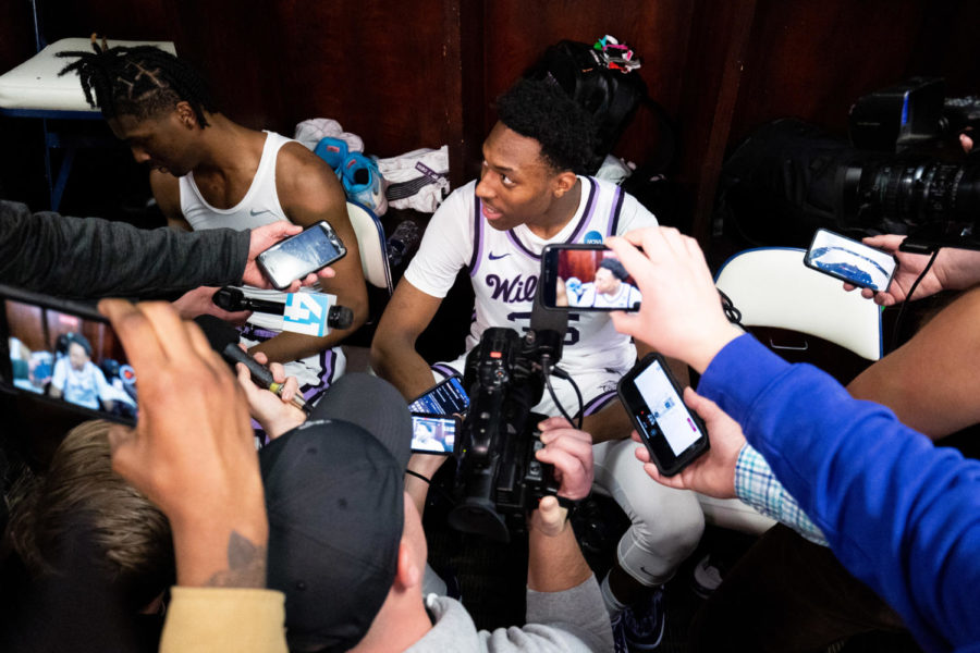Kansas State Wildcats forward NaeQwan Tomlin (35) answers questions from reporters in the locker room after the No. 6 Kentucky vs. No. 3 Kansas State mens basketball game in the second round of the NCAA Tournament on Sunday, March 19, 2023, at Greensboro Coliseum in Greensboro, North Carolina. Kansas State won 75-69. Photo by Jack Weaver | Staff
