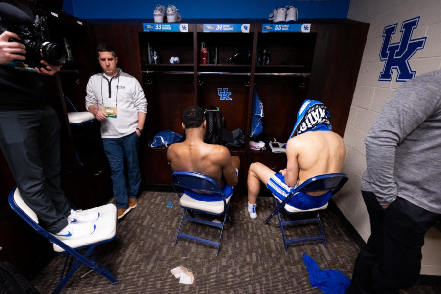 Kentucky Wildcats forwards Oscar Tshiebwe and Lance Ware sit facing their lockers in the locker room after the No. 6 Kentucky vs. No. 3 Kansas State mens basketball game in the second round of the NCAA Tournament on Sunday, March 19, 2023, at Greensboro Coliseum in Greensboro, North Carolina. Kansas State won 75-69. Photo by Jack Weaver | Staff