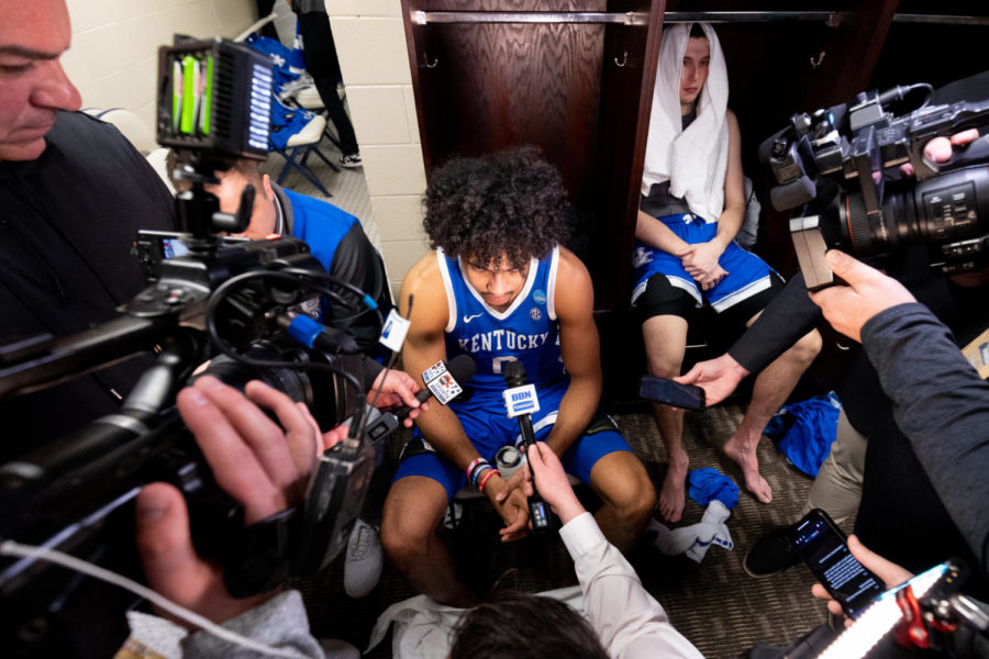 Kentucky Wildcats forward Jacob Toppin (0) answers questions from reporters in the locker room after the No. 6 Kentucky vs. No. 3 Kansas State mens basketball game in the second round of the NCAA Tournament on Sunday, March 19, 2023, at Greensboro Coliseum in Greensboro, North Carolina. Kansas State won 75-69. Photo by Jack Weaver | Staff
