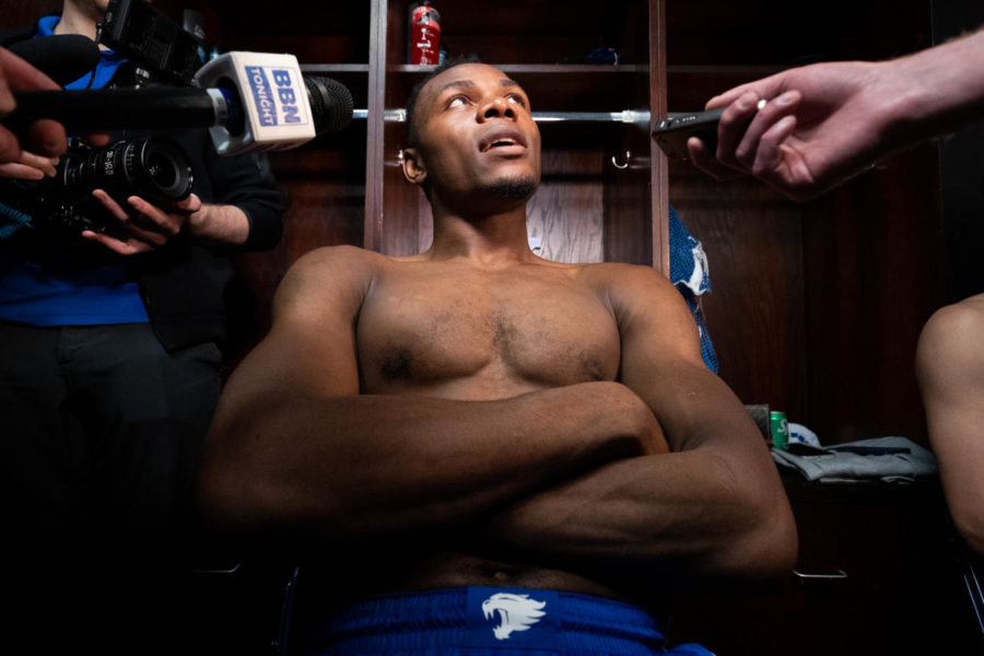 Kentucky Wildcats forward Oscar Tshiebwe answers questions from reporters in the locker room after the No. 6 Kentucky vs. No. 3 Kansas State mens basketball game in the second round of the NCAA Tournament on Sunday, March 19, 2023, at Greensboro Coliseum in Greensboro, North Carolina. Kansas State won 75-69. Photo by Jack Weaver | Staff