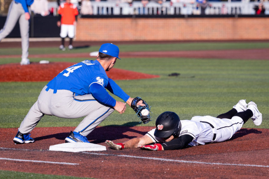 Kentucky Wildcats infielder Hunter Gilliam (14) tags a runner on a pickoff attempt during the No. 18 Kentucky vs. Western Kentucky baseball game on Tuesday, March 28, 2023, at Nick Denes Field in Bowling Green, Kentucky. Kentucky won 10-8. Photo by Olivia Hall | Staff