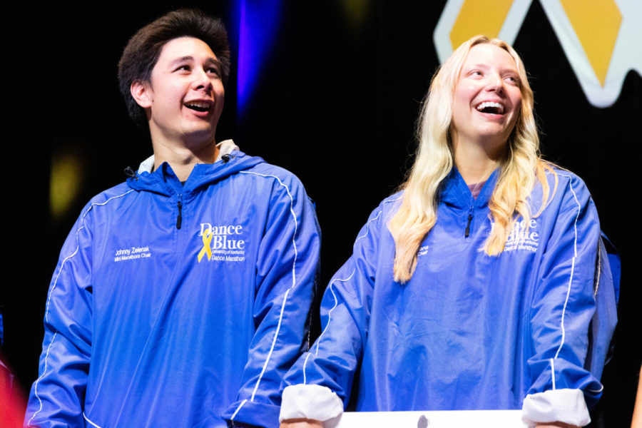 Staff members watch a final video before presenting the total amount of money raised during the 2023 DanceBlue Marathon on Sunday, March 26, 2023, at Memorial Coliseum in Lexington, Kentucky. Photo by Samuel Colmar | Staff