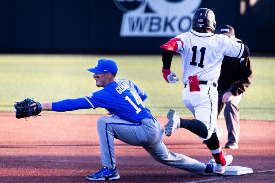 Kentucky Wildcats infielder Hunter Gilliam (14) makes a play at first base during the No. 18 Kentucky vs. Western Kentucky baseball game on Tuesday, March 28, 2023, at Nick Denes Field in Bowling Green, Kentucky. Kentucky won 10-8. Photo by Olivia Hall | Staff
