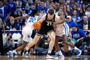 Kentucky Wildcats forward Oscar Tshiebwe (34) defends during the No. 23 Kentucky vs. Vanderbilt mens basketball game on Wednesday, March 1, 2023, at Rupp Arena in Lexington, Kentucky. Photo by Jack Weaver | Staff
