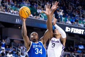 Kentucky Wildcats forward Oscar Tshiebwe (34) shoots the ball during the No. 6 Kentucky vs. No. 3 Kansas State mens basketball game in the second round of the NCAA Tournament on Sunday, March 19, 2023, at Greensboro Coliseum in Greensboro, North Carolina. Photo by Jack Weaver | Staff