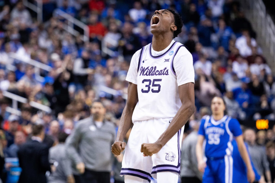 Kansas State Wildcats forward NaeQwan Tomlin (35) celebrates at the end of the first half during the No. 6 Kentucky vs. No. 3 Kansas State mens basketball game in the second round of the NCAA Tournament on Sunday, March 19, 2023, at Greensboro Coliseum in Greensboro, North Carolina. Photo by Jack Weaver | Staff