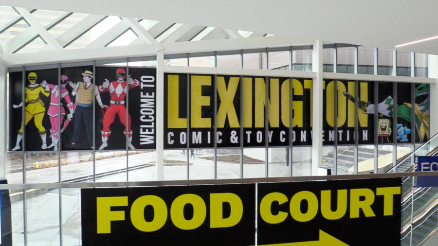 A banner hangs promoting Lexington’s Comic Con at the Lexington Comic and Toy Convention on Friday, March 24, 2023, at Central Bank Center in Lexington, Kentucky. Photo by Nate Lucas | Staff