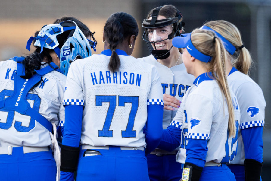 Kentucky players gather at the pitching circle during the No. 16 Kentucky vs. Louisville softball game on Wednesday, March 29, 2023, at John Cropp Stadium in Lexington, Kentucky. Kentucky won 7-4. Photo by Jack Weaver | Staff