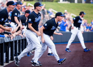 Kentucky players cheer after an inning during the No.10 Kentucky vs. Dayton baseball game on Tuesday, April 4, 2023, in downtown Lexington in Lexington, Kentucky. Photo by Samuel Colmar | Staff