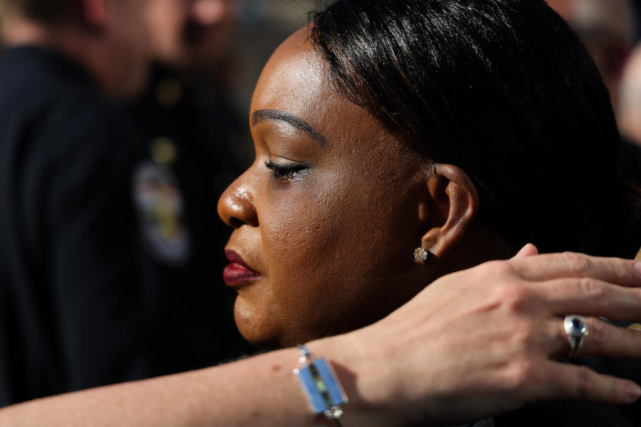 Interim Chief at the Louisville Metro Police Department, Jackie Gwinn-Villaroel, cries during the community vigil honoring the victims of the Louisville mass shooting on Wednesday, April 12, 2023, at the Muhammad Ali Center plaza in Louisville, Kentucky. Kentucky Lantern photo by Abbey Cutrer