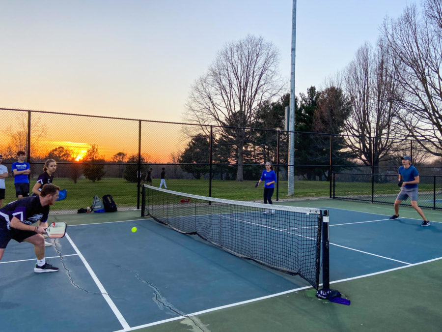Members of the University of Kentucky Pickleball club play a game at Kirklevington Park on Thursday, March 30th, 2023, in Lexington, Kentucky. Photo by Andrea Hicks.