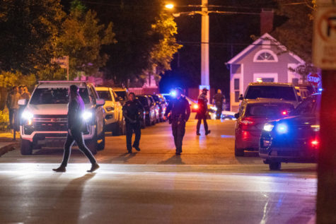Police secure the area around The Hill Bar on Friday, May 5, 2023, on South Limestone Street in Lexington, Kentucky. Photo by Travis Fannon | Staff
