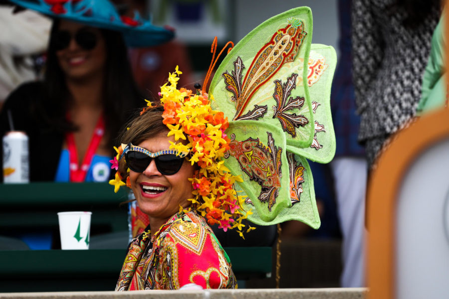 A Derby goer poses for a photo during the 149th Kentucky Derby on Saturday, May 6, 2023, in Churchill Downs in Louisville, Kentucky. Photo by Samuel Colmar | Staff