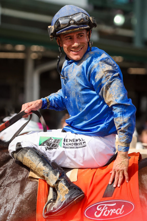 A jockey smiles during the 149th Kentucky Derby on Saturday, May 6, 2023, in Churchill Downs in Louisville, Kentucky. Photo by Samuel Colmar | Staff