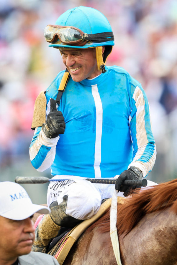 ‘Mage’ Jockey Javier Castellano gives a thumbs up after winning the 149th Kentucky Derby on Saturday, May 6, 2023, in Churchill Downs in Louisville, Kentucky. Photo by Samuel Colmar | Staff
