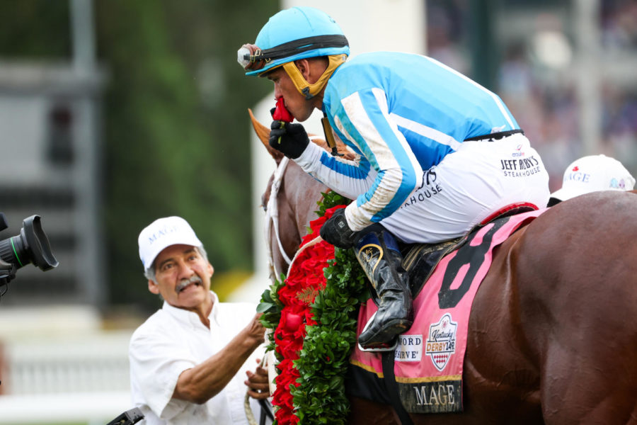 ‘Mage’ Jockey Javier Castellano kisses a rose after winning the 149th Kentucky Derby on Saturday, May 6, 2023, in Churchill Downs in Louisville, Kentucky. Photo by Samuel Colmar | Staff