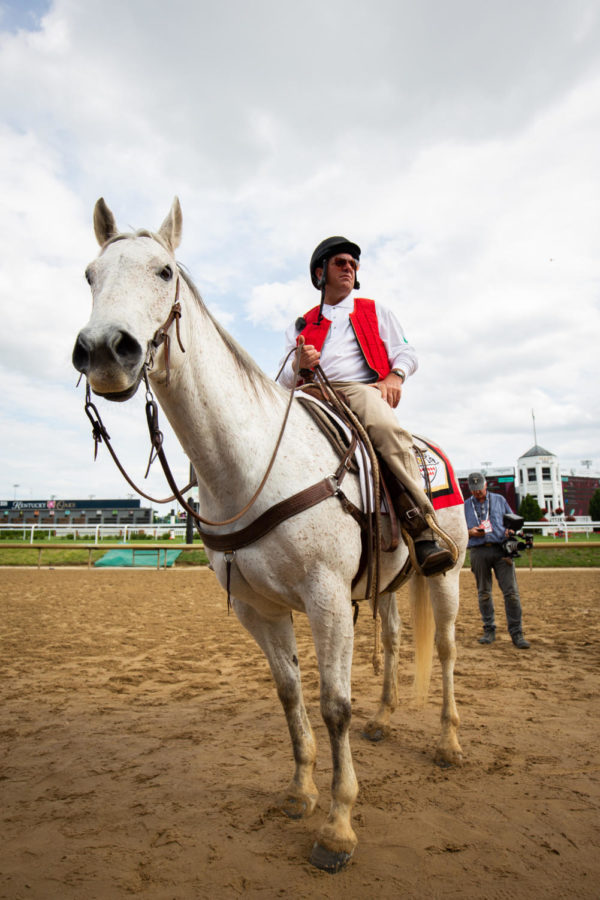 A horseback rider waits during the 149th Kentucky Derby on Saturday, May 6, 2023, in Churchill Downs in Louisville, Kentucky. Photo by Samuel Colmar | Staff