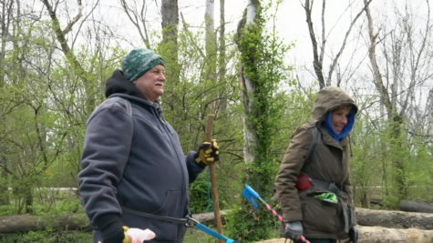 Cliff Jaggie and Liz Otto embark on a quest to find pollution in a forested area of Jacobson Park in Lexington, Kentucky on March 25, 2023. Photo by Katherine Duckworth