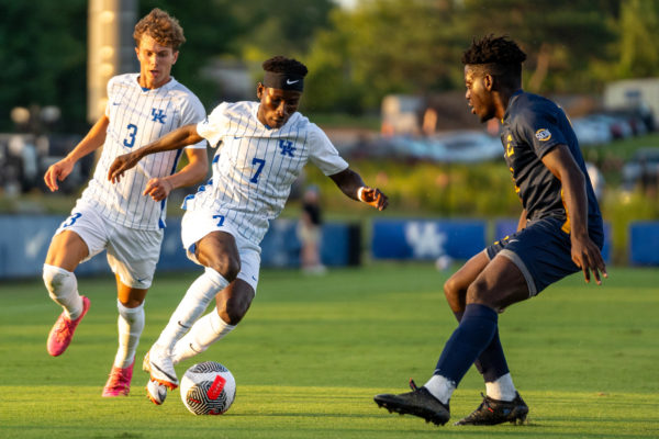 Kentucky Wildcats midfielder Alfred Baafi (7) dribbles the ball up the pitch during the Kentucky vs. ETSU mens soccer match on Monday, Aug. 28, 2023, at the Wendell and Vickie Bell Soccer Complex in Lexington, Kentucky. Kentucky won 1-0. Photo by Travis Fannon | Staff