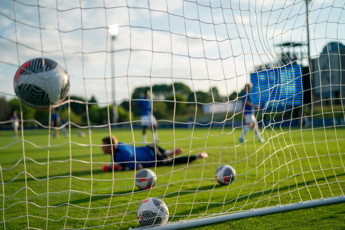 Players warm up before the Kentucky vs. ETSU mens soccer match on Monday, Aug. 28, 2023, at the Wendell and Vickie Bell Soccer Complex in Lexington, Kentucky. Kentucky won 1-0. Photo by Travis Fannon | Staff