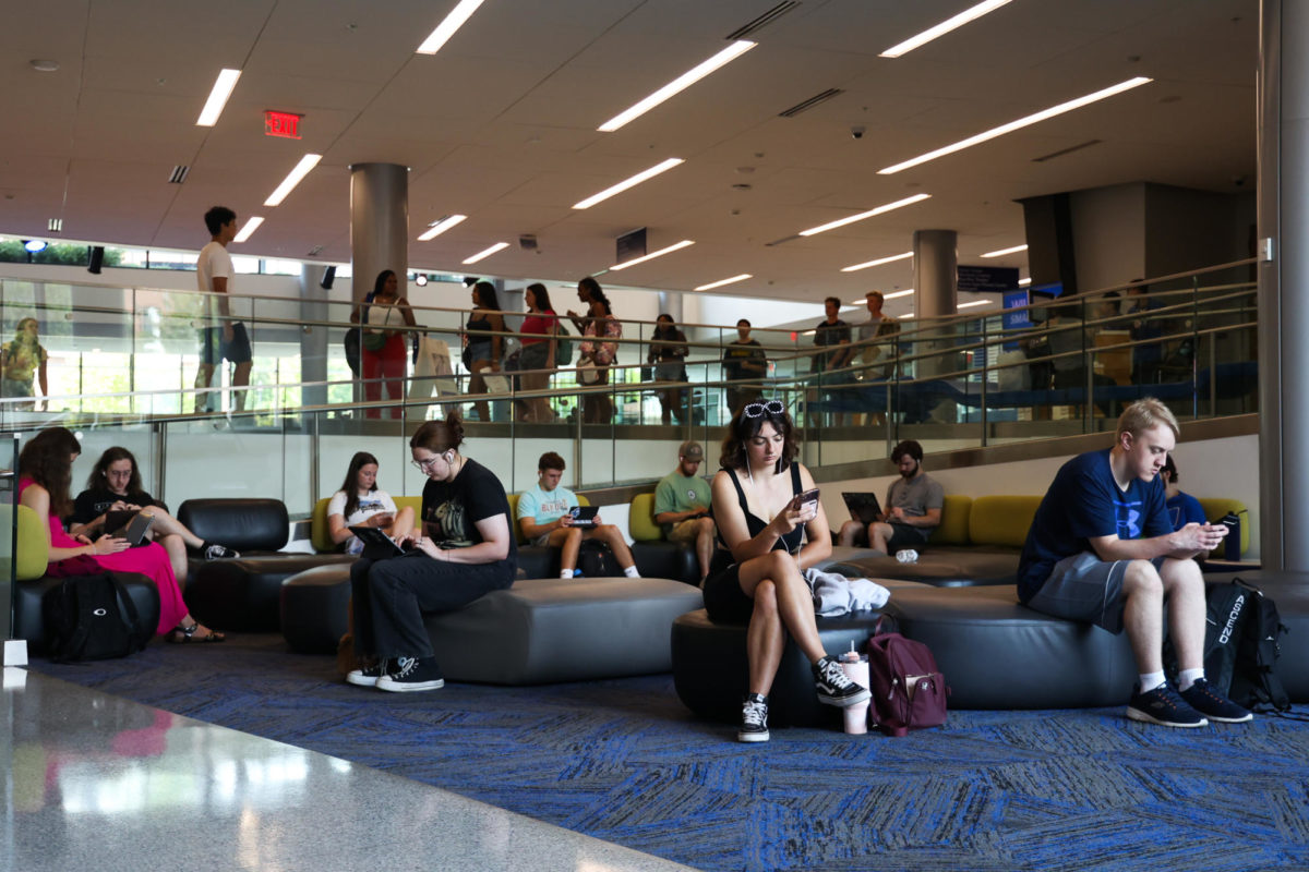 Students sit in the Gatton Student Center on the first day of class on Monday, Aug. 21, 2023, at the University of Kentucky in Lexington, Kentucky. Photo by Abbey Cutrer | Staff