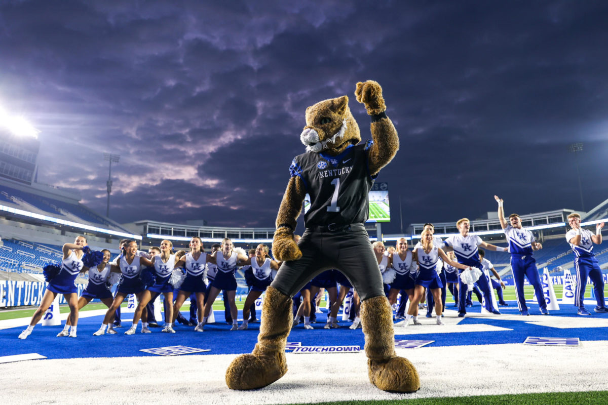 The Wildcat dances with the cheerleaders during Big Blue U on Wednesday, Aug. 16, 2023, at Kroger Field in Lexington, Kentucky. Photo by Abbey Cutrer | Staff