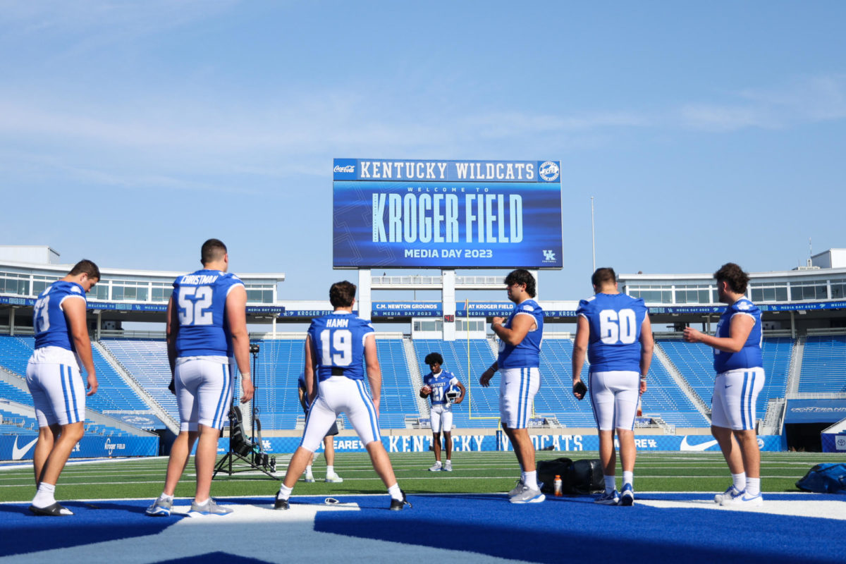 Kentucky Wildcats players wait to get their photo taken during Media Day on Friday, Aug. 4, 2023, at Kroger Field in Lexington, Kentucky. Photo by Abbey Cutrer | Staff