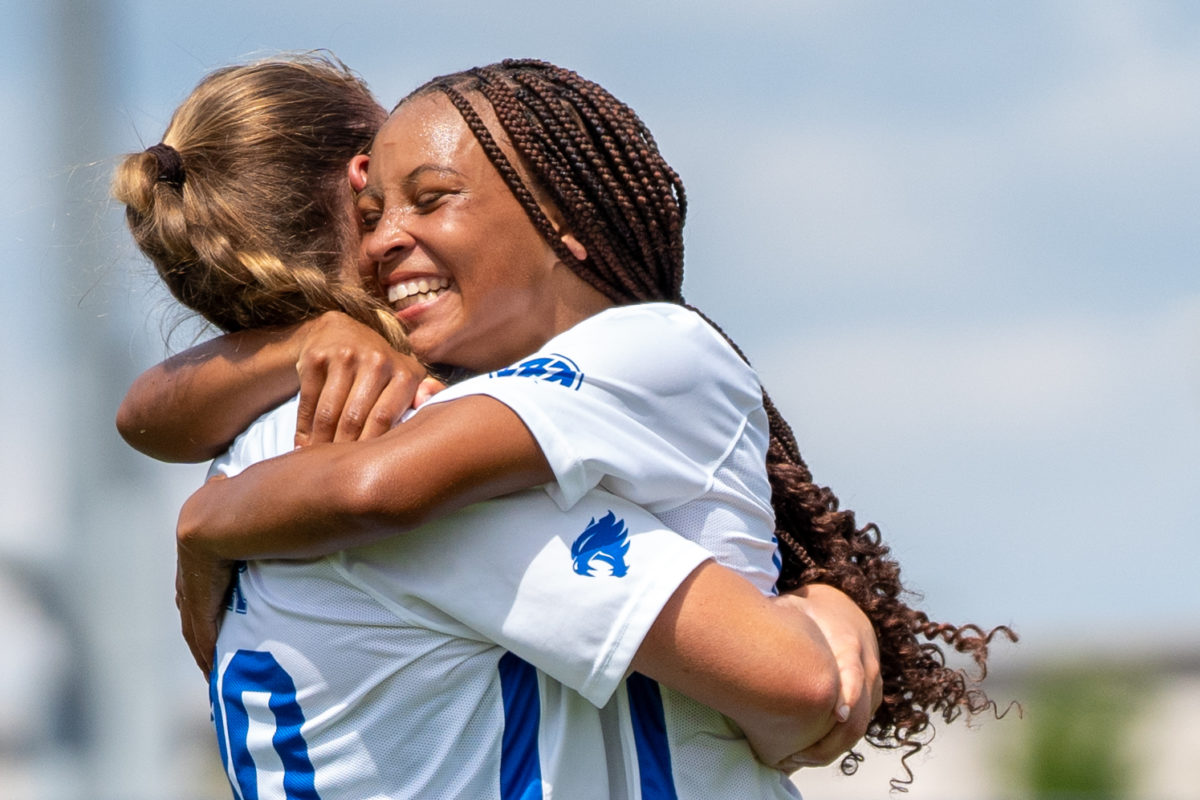 Kentucky Wildcats midfielder Tanner Strickland (10) and forward Jordyn Rhodes (30) hug after Kentucky scores a goal during the Kentucky vs. Illinois womens soccer match on Sunday, Sept. 3, 2023 at the Wendell and Vickie Bell Soccer Complex in Lexington, Kentucky. Kentucky won 1-0. Photo by Travis Fannon | Staff
