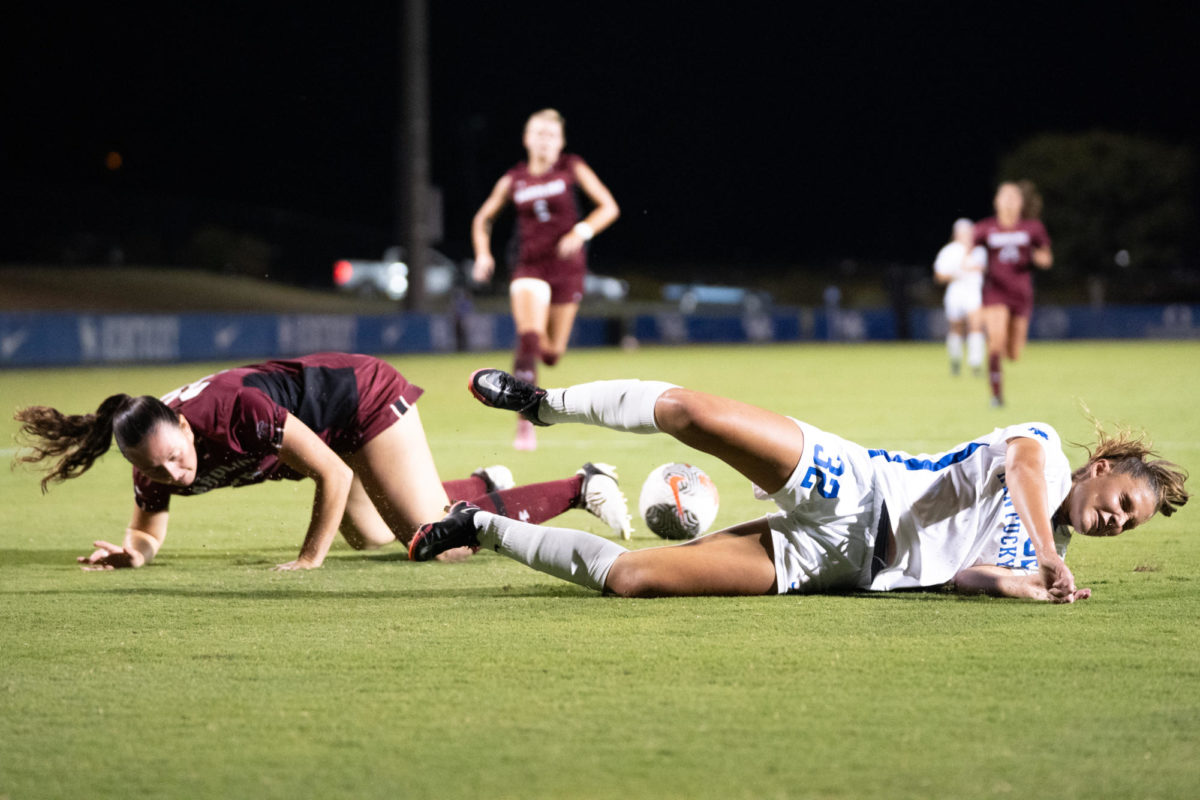 Kentucky defender Grace Hoytink falls while fighting for control of the ball during the Kentucky vs. South Carolina womens soccer match on Thursday, Sept. 21, 2023, at the Wendell and Vickie Bell Soccer Complex in Lexington, Kentucky. Kentucky tied 0-0. Photo by Travis Fannon | Staff