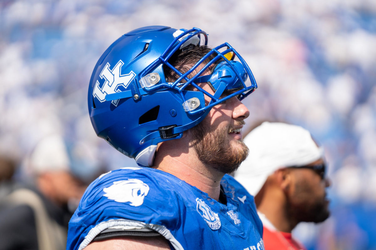 Kentucky offensive lineman Eli Cox walks off the field after the Kentucky vs. Florida football game on Saturday, Sept. 30, 2023, at Kroger Field in Lexington, Kentucky. Kentucky won 33-14. Photo by Travis Fannon | Staff