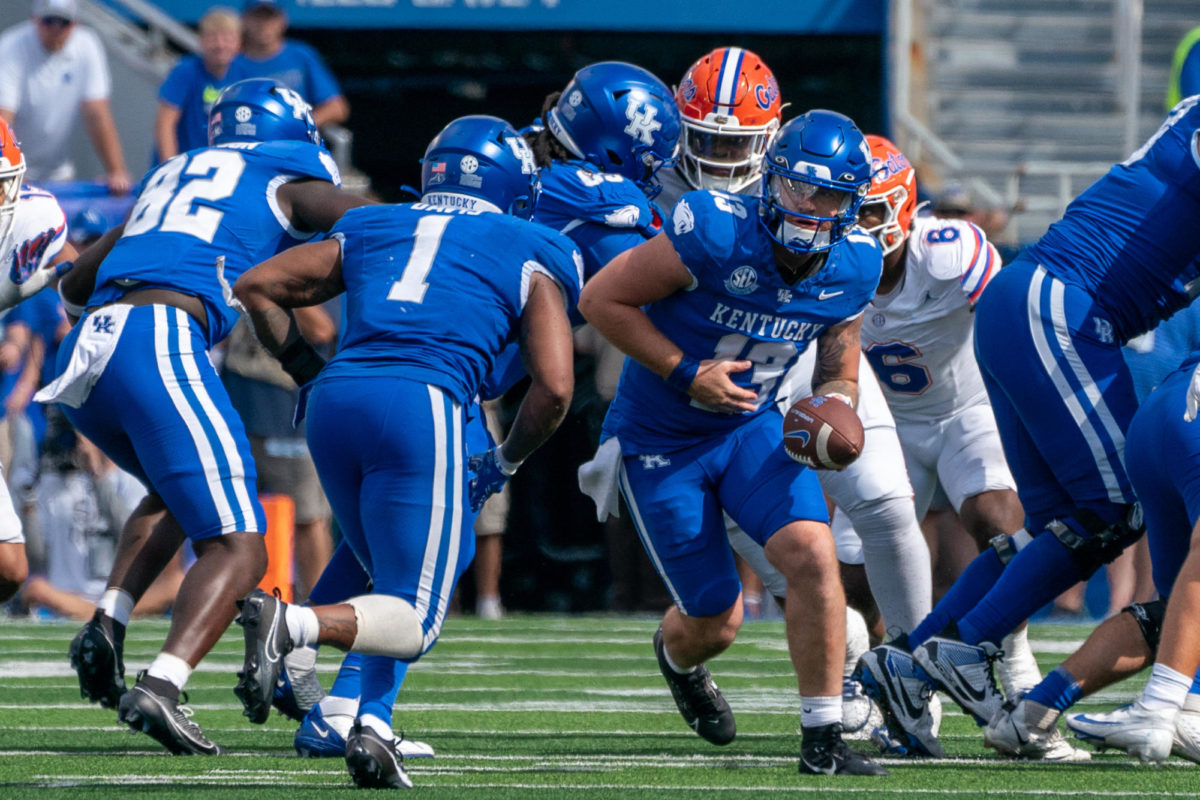 Kentucky quarterback Devin Leary hands off the ball to running back Ray Davis during the Kentucky vs. Florida football game on Saturday, Sept. 30, 2023, at Kroger Field in Lexington, Kentucky. Kentucky won 33-14. Photo by Savanna Emrick | Staff