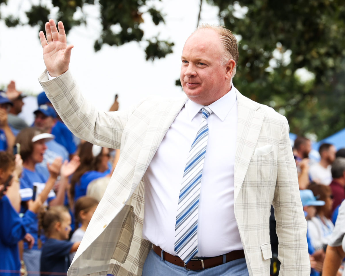 Kentucky head coach Mark Stoops waves to fans at the Cat Walk before the Kentucky vs. Eastern Kentucky football game on Saturday, Sept. 9, 2023, at Kroger Field in Lexington, Kentucky. Photo by Abbey Cutrer | Staff
