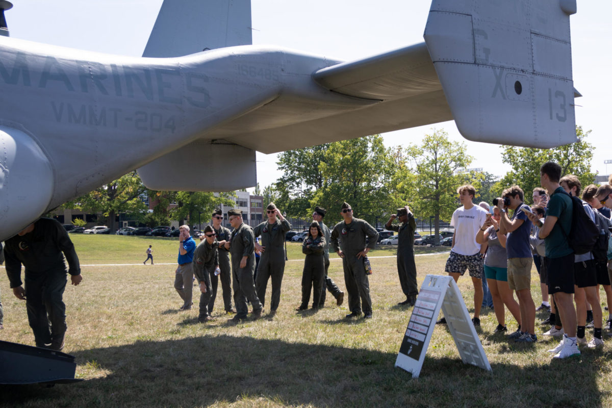 Attendees wait to board the MV-22B Osprey during the Engineering Takes Flight event on Thursday, Sept. 14, 2023, at the South Lawn in Lexington, Kentucky. Photo by Samuel Colmar | Staff