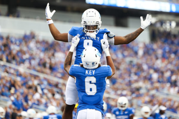 Kentucky wide receiver Dane Key lifts wide receiver Tayvion Robinson up after a touchdown during the Kentucky vs. Eastern Kentucky football game on Saturday, Sept. 9, 2023, at Kroger Field in Lexington, Kentucky. Kentucky won 28-17. Photo by Abbey Cutrer | Staff