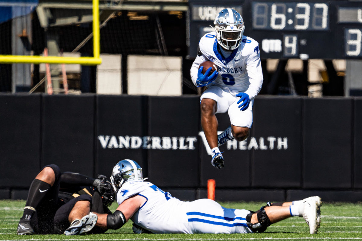 Kentucky Wildcats running back Demie Sumo-Kamgbaye (0) hurtles a collision during the Kentucky vs. Vanderbilt football game on Saturday, Sept. 23, 2023 at FirstBank Stadium in Nashville, Tennessee. UK won 45-28. Photo by Isaiah Pinto | Staff