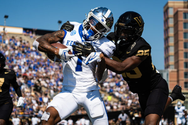 Vanderbilt Commodores Martel Hight (25) wraps Kentucky Wildcats wideout Barion Brown (7) during the Kentucky vs. Vanderbilt football game on Saturday, Sept. 23, 2023 at FirstBank Stadium in Nashville, Tennessee. UK won 45-28. Photo by Isaiah Pinto | Staff