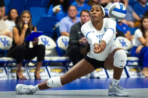 Kentucky Wildcats outside hitter Reagan Rutherford (10) sets the ball during the Kentucky vs. Pitt volleyball match on Friday, Sept. 1, 2023, at Rupp Arena in Lexington, Kentucky. Kentucky lost 3-0. Photo by Samuel Colmar | Staff