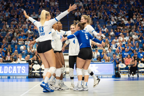 Kentucky players celebrate scoring a point during the Kentucky vs. Pitt volleyball match on Friday, Sept. 1, 2023, at Rupp Arena in Lexington, Kentucky. Kentucky lost 3-0. Photo by Travis Fannon | Staff