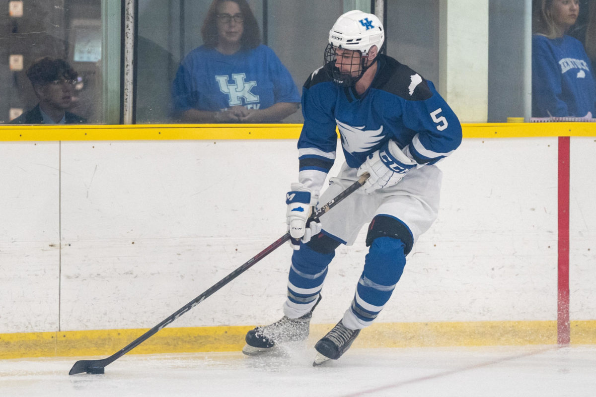 Kentucky defenseman Tim Burke controls the puck during the Kentucky vs. Louisville hockey game on Friday, Sept. 29, 2023, at the Lexington Ice Center in Lexington, Kentucky. Kentucky lost 1-0. Photo by Travis Fannon | Staff