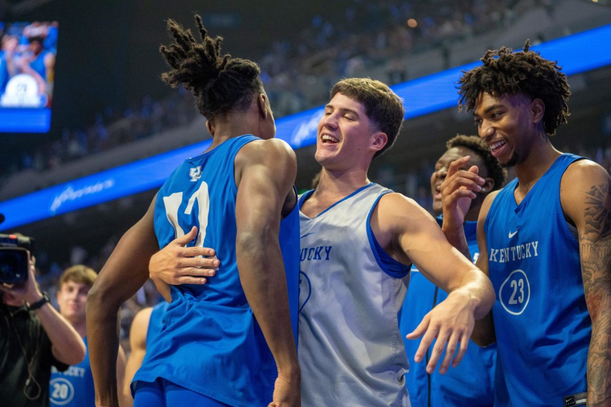 Kentucky Wildcats guards Reed Sheppard (15), Jordan Burks (23) and Antonio Reeves (12) celebrate during Big Blue Madness on Friday, Oct. 13, 2023, inside Rupp Arena in Lexington, Kentucky. Photo by Travis Fannon | Staff