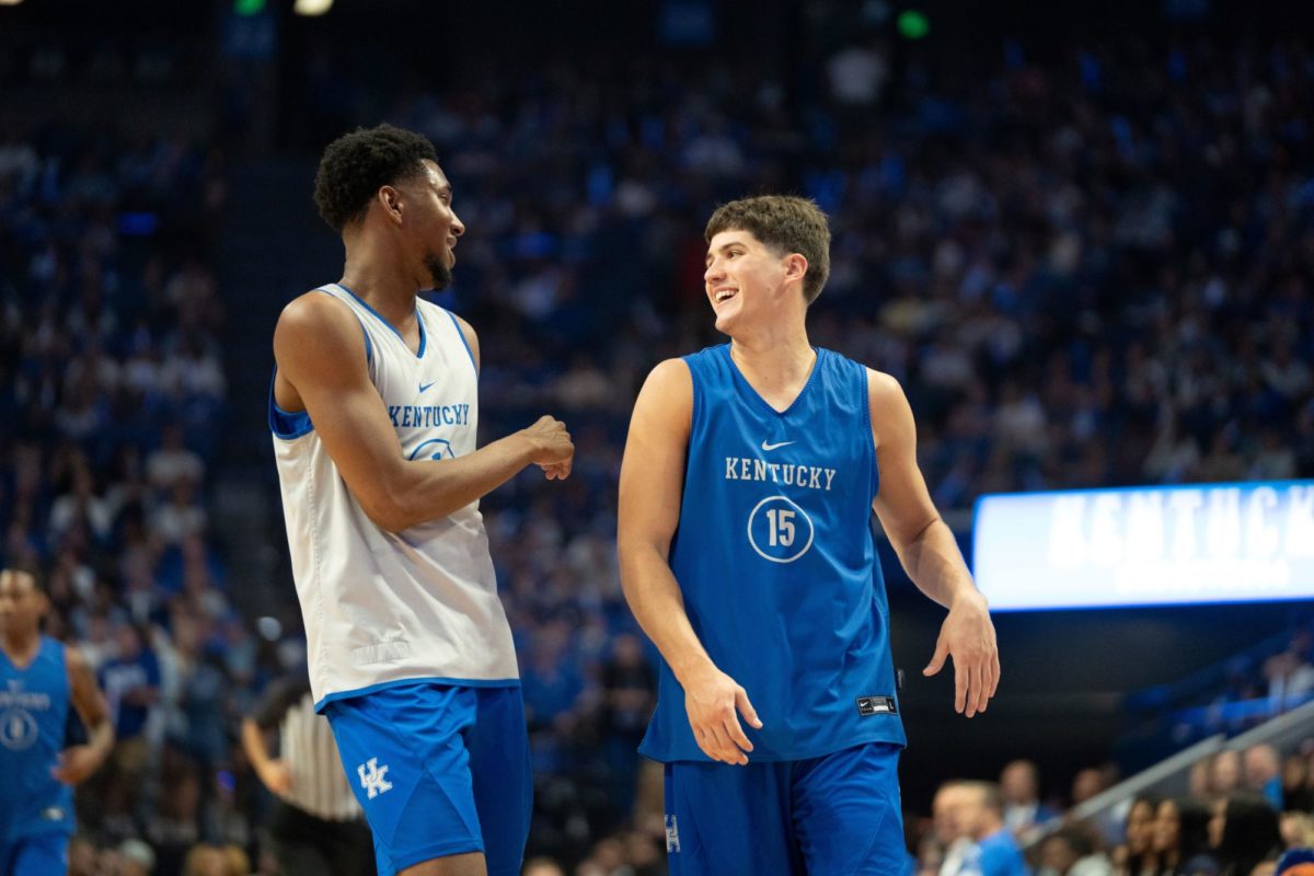 Kentucky Wildcats guards Reed Sheppard (15) and Justin Edwards (1) laugh during Big Blue Madness on Friday, Oct. 13, 2023, inside Rupp Arena in Lexington, Kentucky. Photo by Travis Fannon | Staff