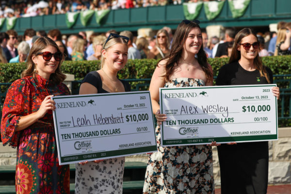 Leah Hebenstreit and Alex Wesley are awarded 10,000 dollar scholarships during College day at Keeneland on Friday, Oct. 13, 2023. in Lexington, Kentucky. Photo by Kyleigh Miller | staff  