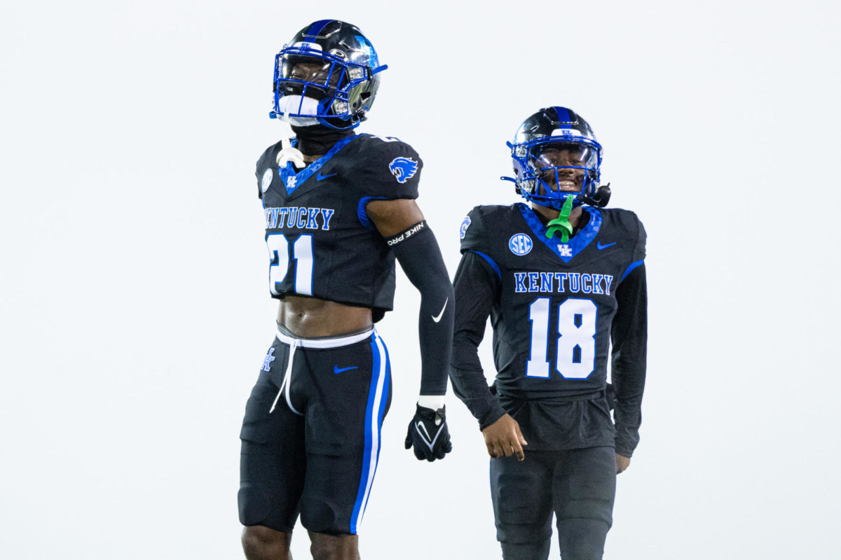 Kentucky defensive back Nasir Addison and wideout Brandon White trots out of the fog during the Kentucky vs. Missouri football game on Saturday, Oct. 14, 2023, at Kroger Field in Lexington, Kentucky. Kentucky lost 38-21. Photo by Isaiah Pinto | Staff