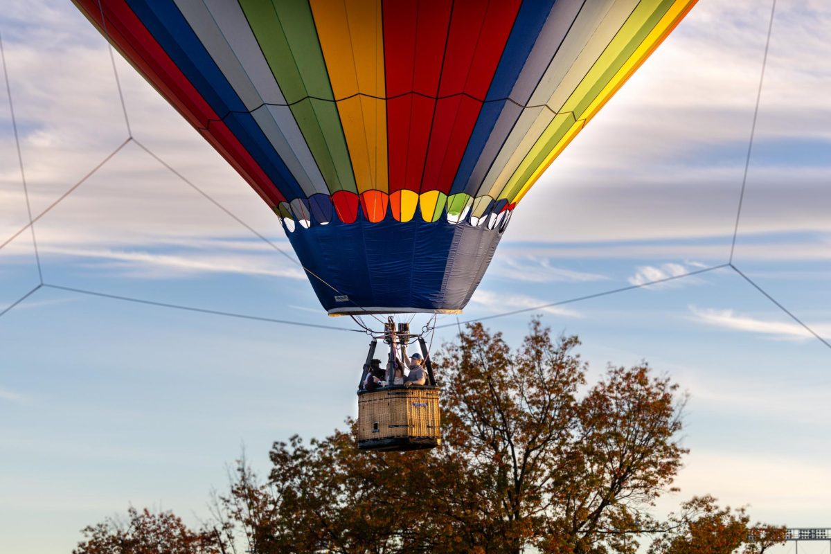 The first hot air balloon sending students up during UP, UP and UK on Wednesday, Oct. 18, 2023, at Pieratt Fields in Lexington, Kentucky. Photo by Kyleigh Miller | Staff