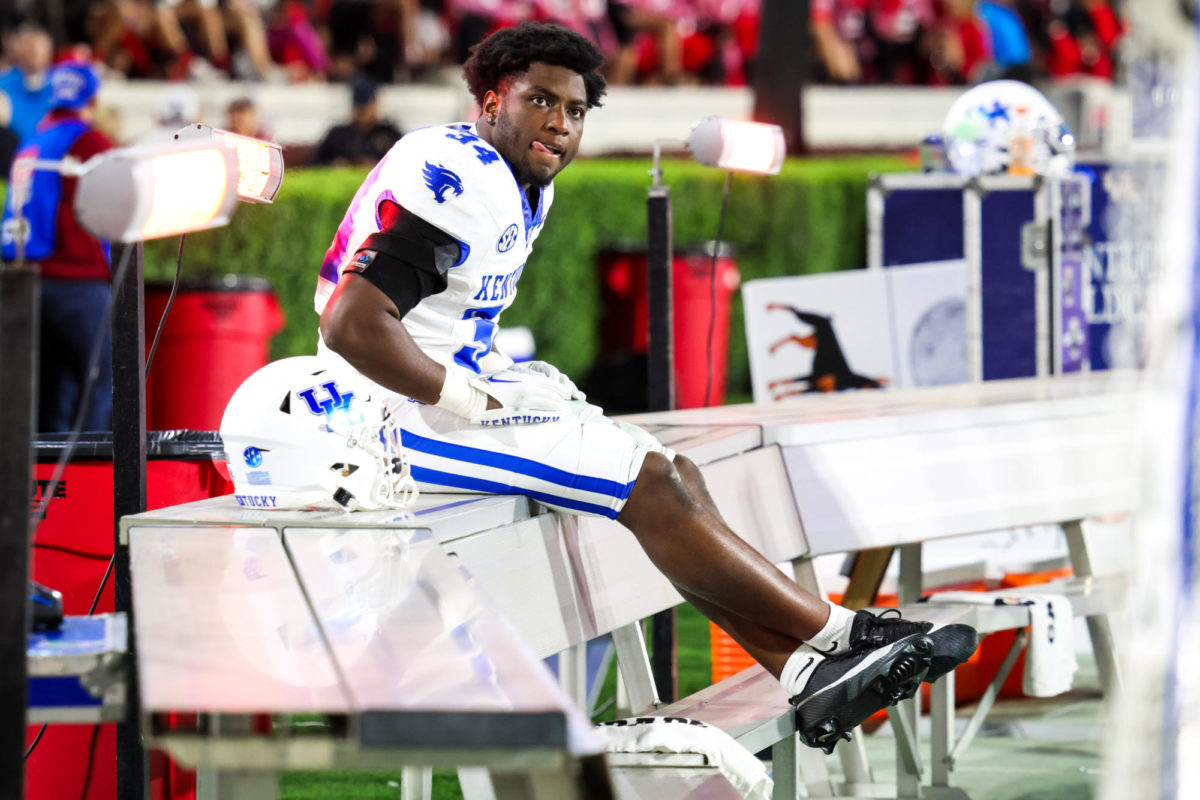 Kentucky linebacker Jayvant Brown (34) sits on the bench during the Kentucky vs. Georgia football game on Saturday, Oct. 7, 2023, at Sanford Stadium in Athens, Georgia. Kentucky lost 51-13. Photo by Samuel Colmar | Staff