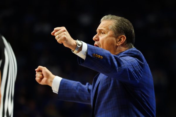 Kentucky Wildcats head coach John Calipari puts his fists up during the Kentucky vs. Georgetown men's basketball game on Friday, Oct. 27, 2023, at Rupp Arena in Lexington, Kentucky. Kentucky won 92-69. Photo by Abbey Cutrer | Staff