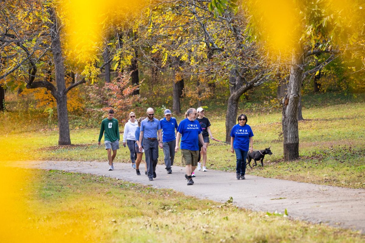 Participants walk during the Walk With a Doc event on Tuesday, Oct. 24, 2023, at the Arboretum, State Botanical Garden of Kentucky in Lexington, Kentucky. Photo by Samuel Colmar | Staff
